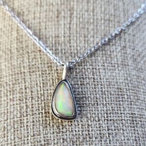 Artisan Made Irridescent Welo Opal Pendant Necklace. One Of A Kind